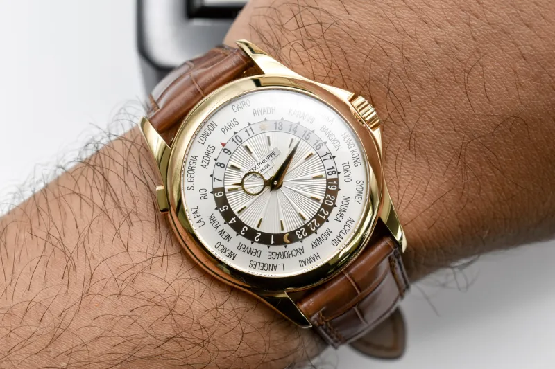 Patek Philippe 18ct Yellow Gold World Time Watch 5130J | Box & Papers