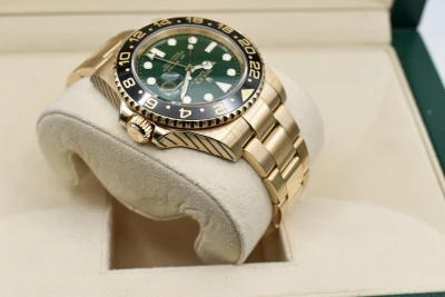 Rolex GMT Master ll 18ct Yellow Gold Green Dial 40mm Watch 116718LN