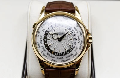 Patek Philippe 18ct Yellow Gold World Time Watch 5130J | Box & Papers