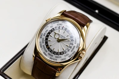 Patek Philippe 18ct Yellow Gold World Time Watch 5130J | Box & Papers
