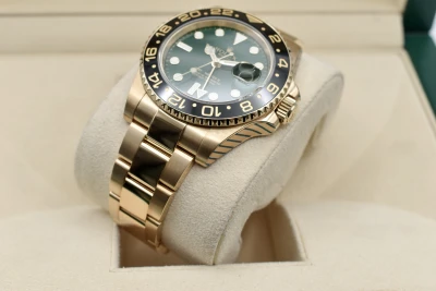 Rolex GMT Master ll 18ct Yellow Gold Green Dial 40mm Watch 116718LN