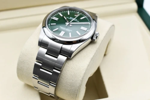 Rolex Oyster Perpetual Stainless Steel Green Dial Watch 134300 | 2026 Unworn