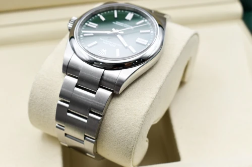 Rolex Oyster Perpetual Stainless Steel Green Dial Watch 134300 | 2026 Unworn