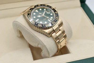 Rolex GMT Master ll 18ct Yellow Gold Green Dial 40mm Watch 116718LN