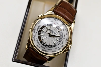 Patek Philippe 18ct Yellow Gold World Time Watch 5130J | Box & Papers