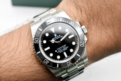 Rolex Submariner Stainless Steel Black Dial Watch 114060 | 2017 Box & Papers