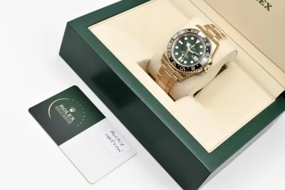 Rolex GMT Master ll 18ct Yellow Gold Green Dial 40mm Watch 116718LN