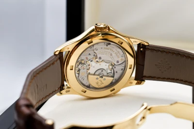 Patek Philippe 18ct Yellow Gold World Time Watch 5130J | Box & Papers