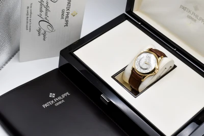 Patek Philippe 18ct Yellow Gold World Time Watch 5130J | Box & Papers