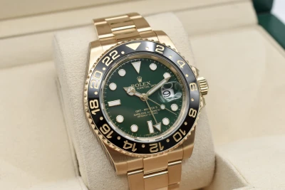 Rolex GMT Master ll 18ct Yellow Gold Green Dial 40mm Watch 116718LN