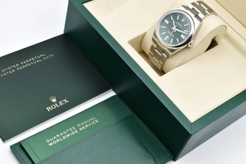 Rolex Oyster Perpetual Stainless Steel Green Dial Watch 134300 | 2026 Unworn