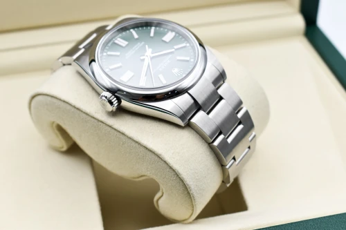 Rolex Oyster Perpetual Stainless Steel Green Dial Watch 134300 | 2026 Unworn