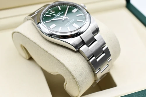 Rolex Oyster Perpetual Stainless Steel Green Dial Watch 134300 | 2026 Unworn