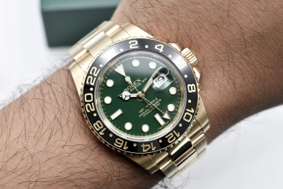 Rolex GMT Master ll 18ct Yellow Gold Green Dial 40mm Watch 116718LN