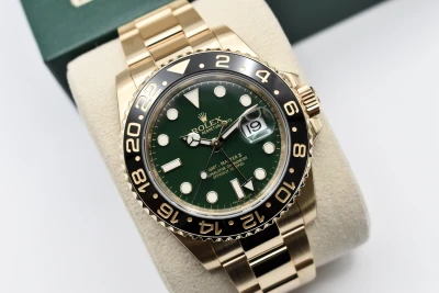 Rolex GMT Master ll 18ct Yellow Gold Green Dial 40mm Watch 116718LN